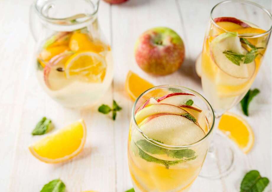 White sangria with delicious apples and oranges.