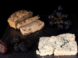Blue cheeses that add character to any board are Roquefort or Cabrales.
