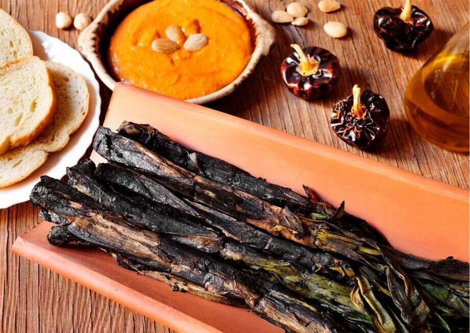 Calçots are a seasonal vegetable to enjoy with romesco sauce.