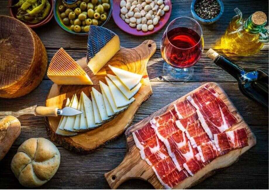 Iberico ham and Manchego cheese are two iconic Spanish tapas.