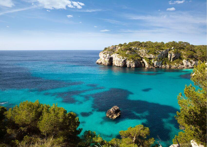 Cala Macarella lying in the break of a cliff and its turquoise waters will remain forever etched in your retina.