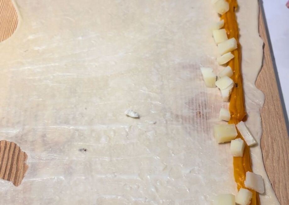 Chef Carlos Gumiel preparing his unique twist on Ensaimada Mallorquina with cheese and sweet potato cream.