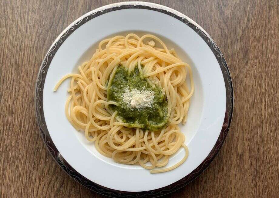 Savor the fusion of flavors in Fettuccine pasta, coated with a unique Manchego pesto sauce.