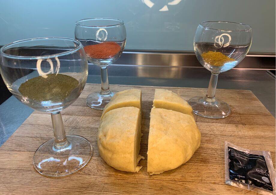 nce the dough is formed, cut it into four pieces.