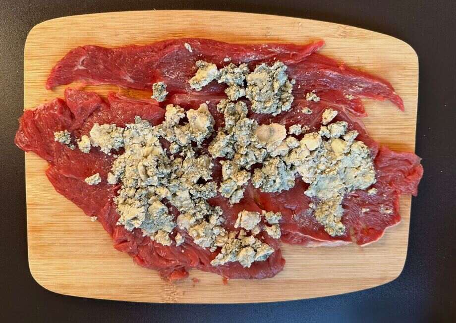 After adding the layer of Cabrales cheese, top it with the second fillet.