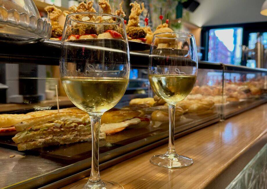 You can't fully enjoy pintxos without pairing them with a good glass of txakoli.