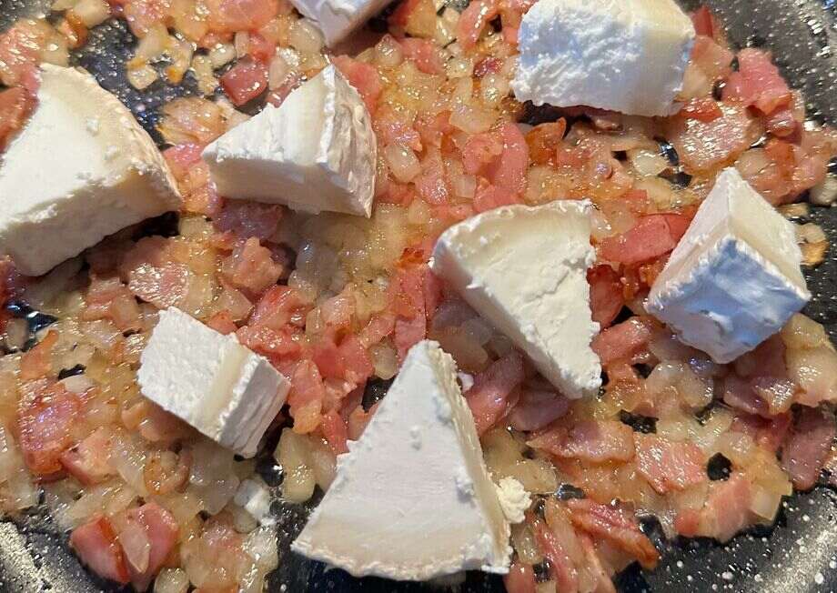 Keep stirring the sauce until the goat cheese has fully melted and the sauce is smooth.