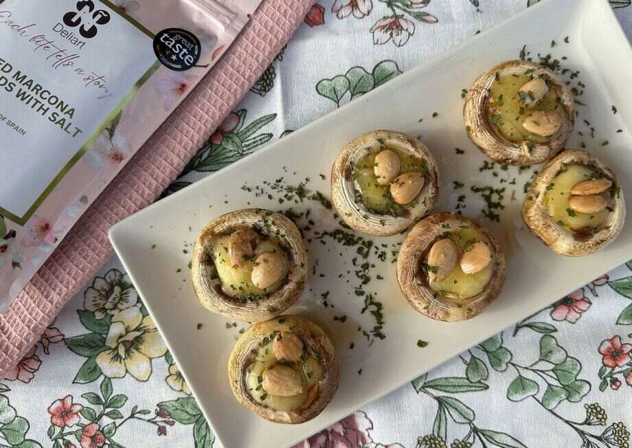 These mushrooms pair Mahon cheese with crunchy Marcona almonds for a rich flavor.