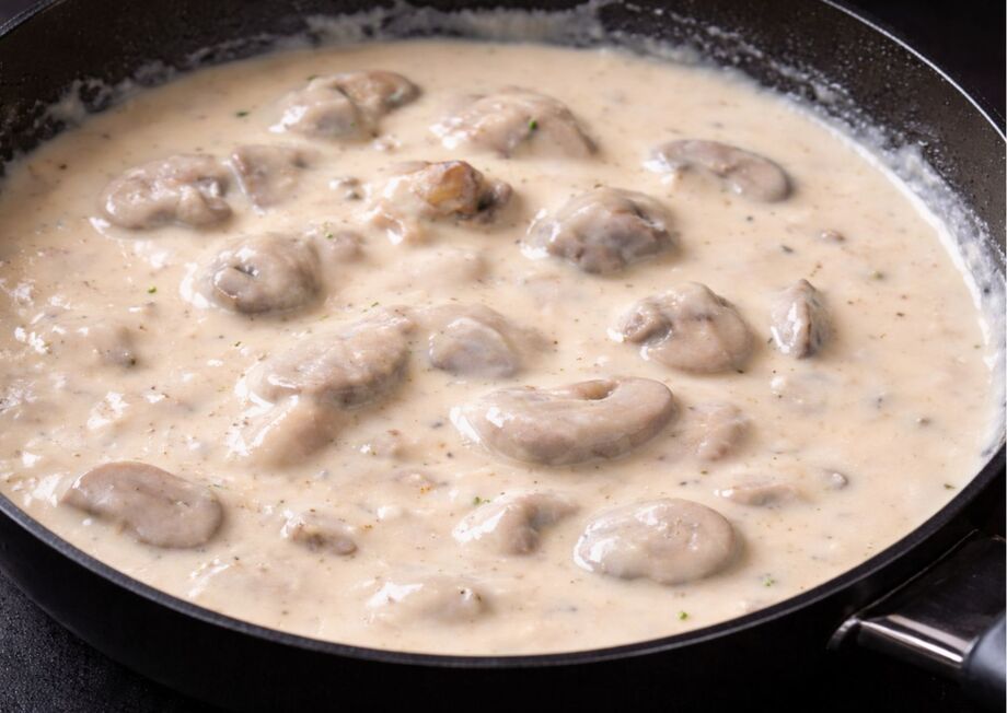 Add diced ham and cook for one minute to let it release its flavor into the sauce.